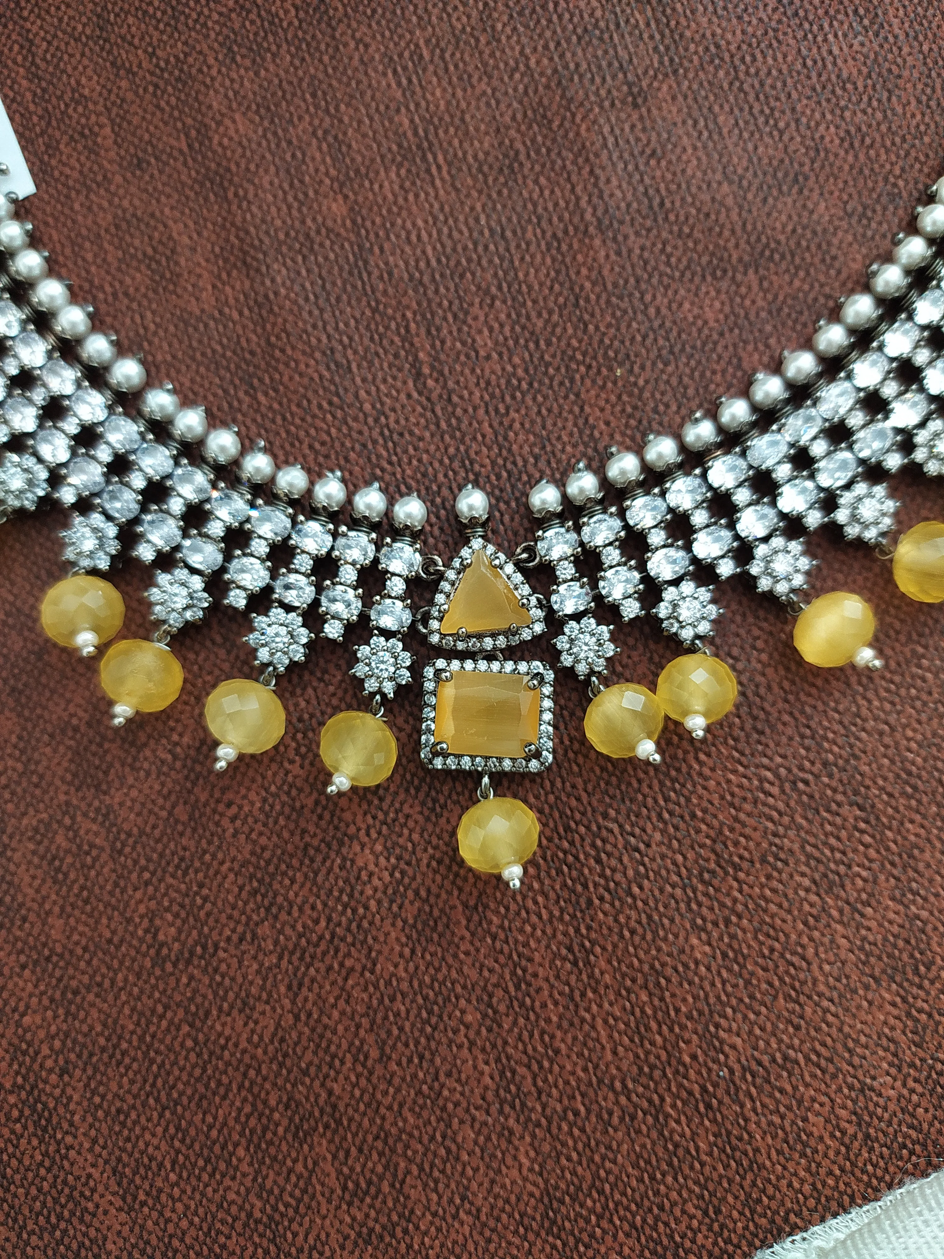 Zircon necklace with beautiful beads dangling Having Victorian Polish